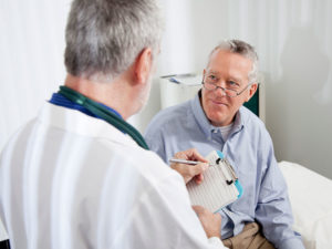 Patient Talking To Doctor
