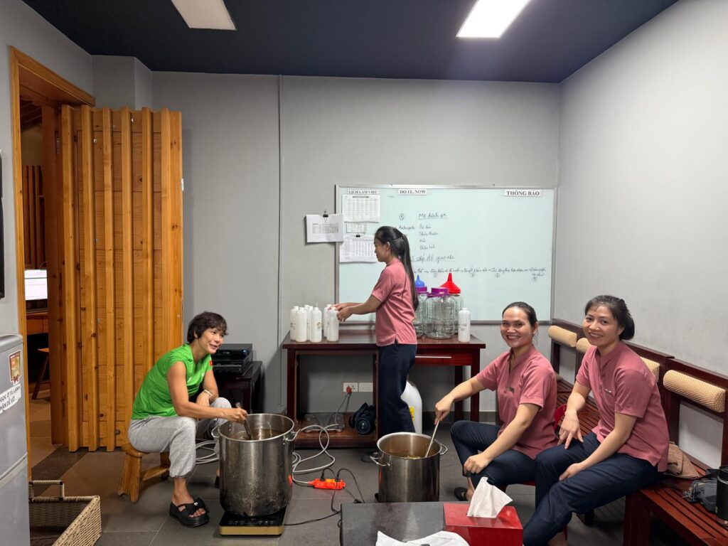 Employees cooking dinner at Alba Wellness resort